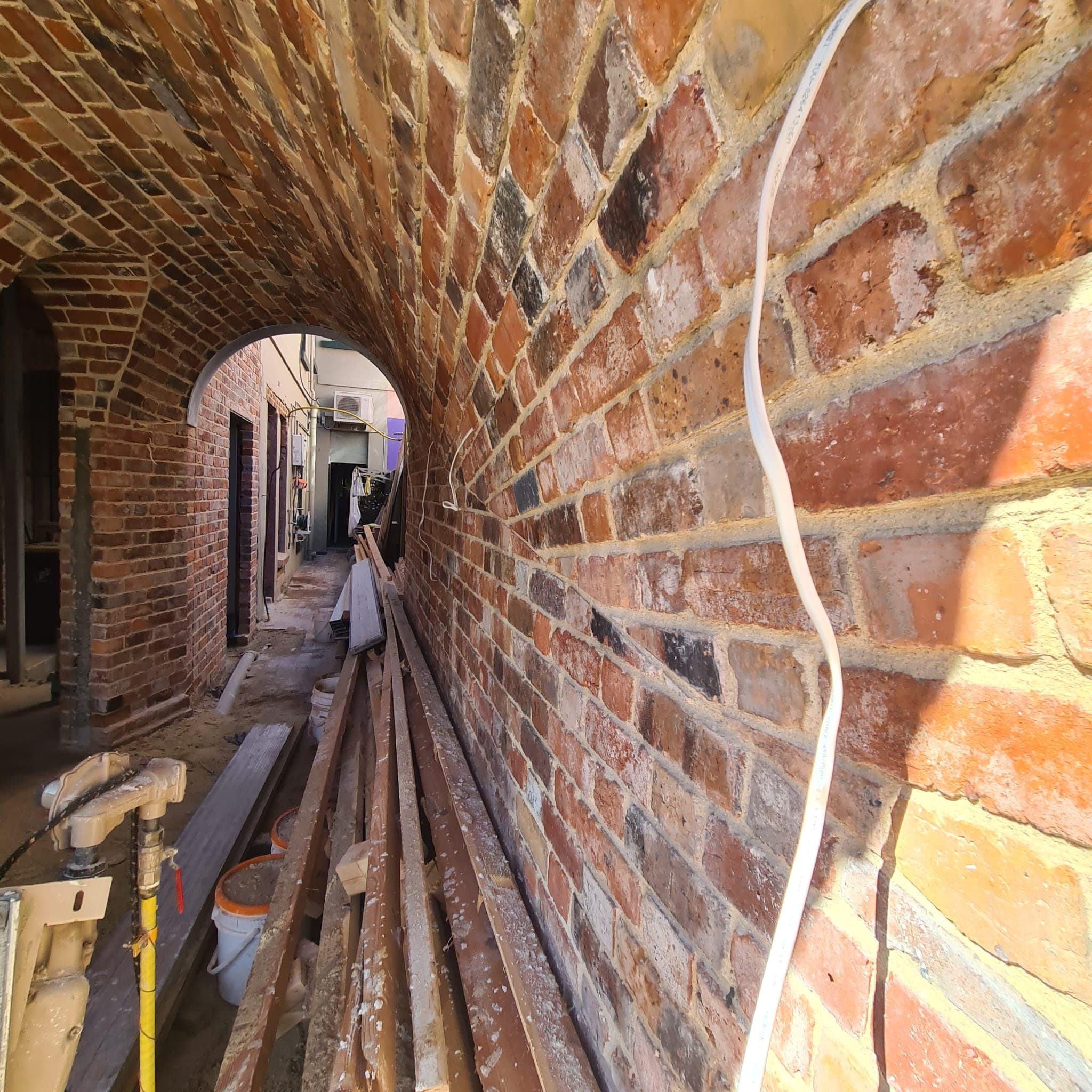 Curved brick tunnel vault detail handcrafted by Goodwin Bricklaying in Fitzroy