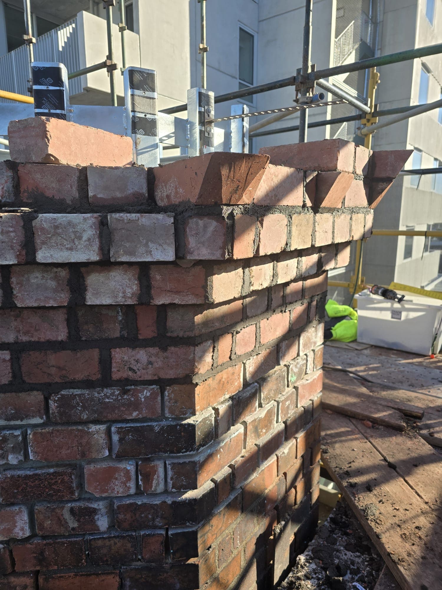 Rebuilt chimney crown capping detail on the Old Licorice Factory, Brunswick