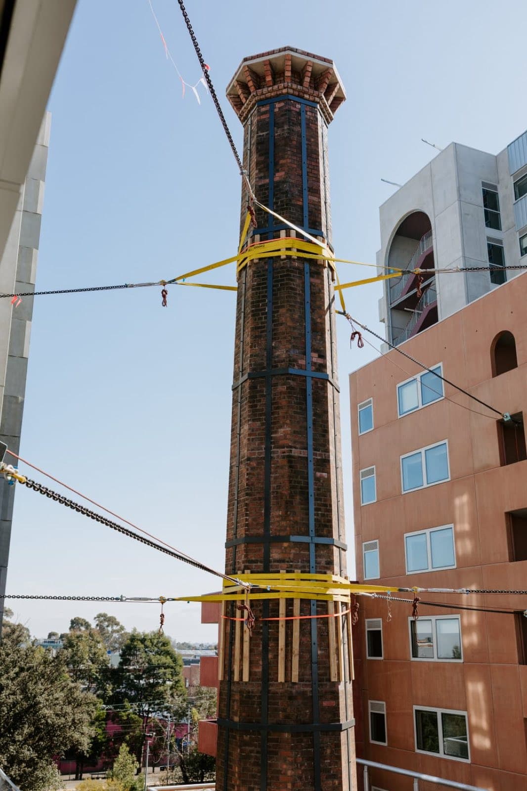 The full height of the restored octagonal brick chimney at the Old Licorice Factory, Brunswick, by Goodwin Bricklaying