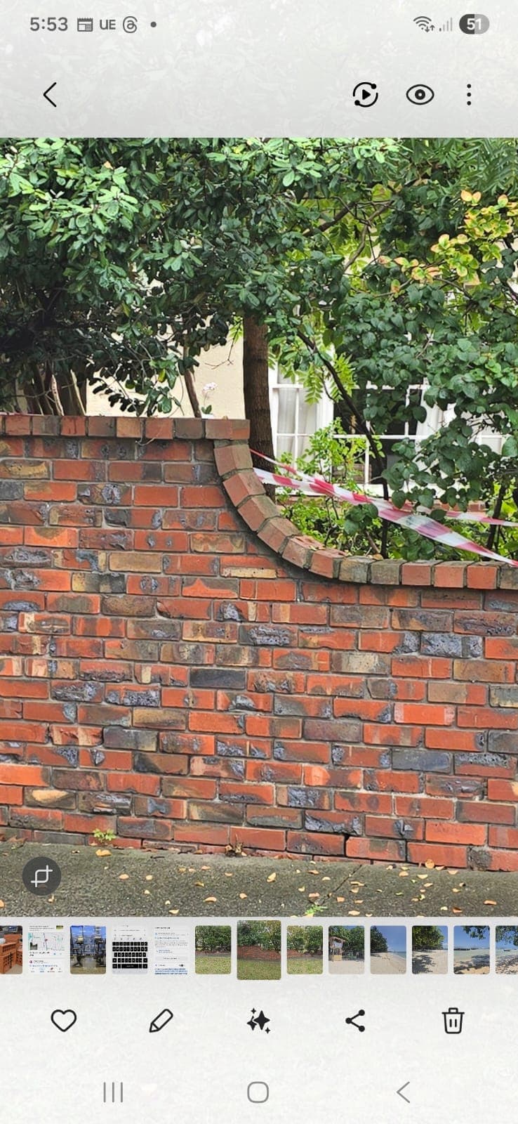 Heritage garden wall rebuild with reclaimed brick for a Surrey Hills period property