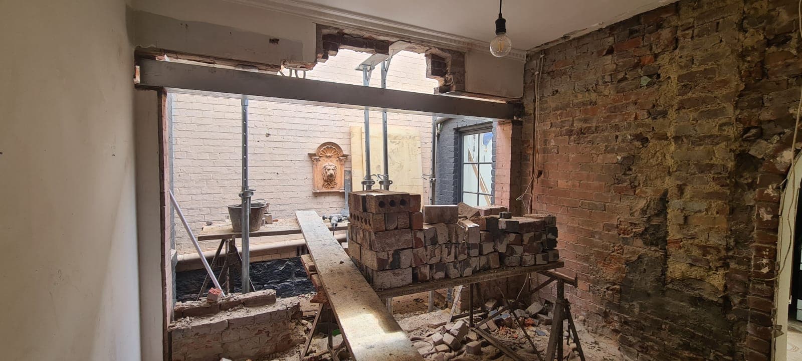 Steel beams installed to stabilise and reinforce heritage brickwork during structural repair by Goodwin Bricklaying