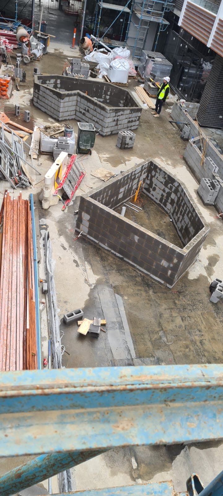 Elevated view of commercial blockwork structures on a Melbourne building site