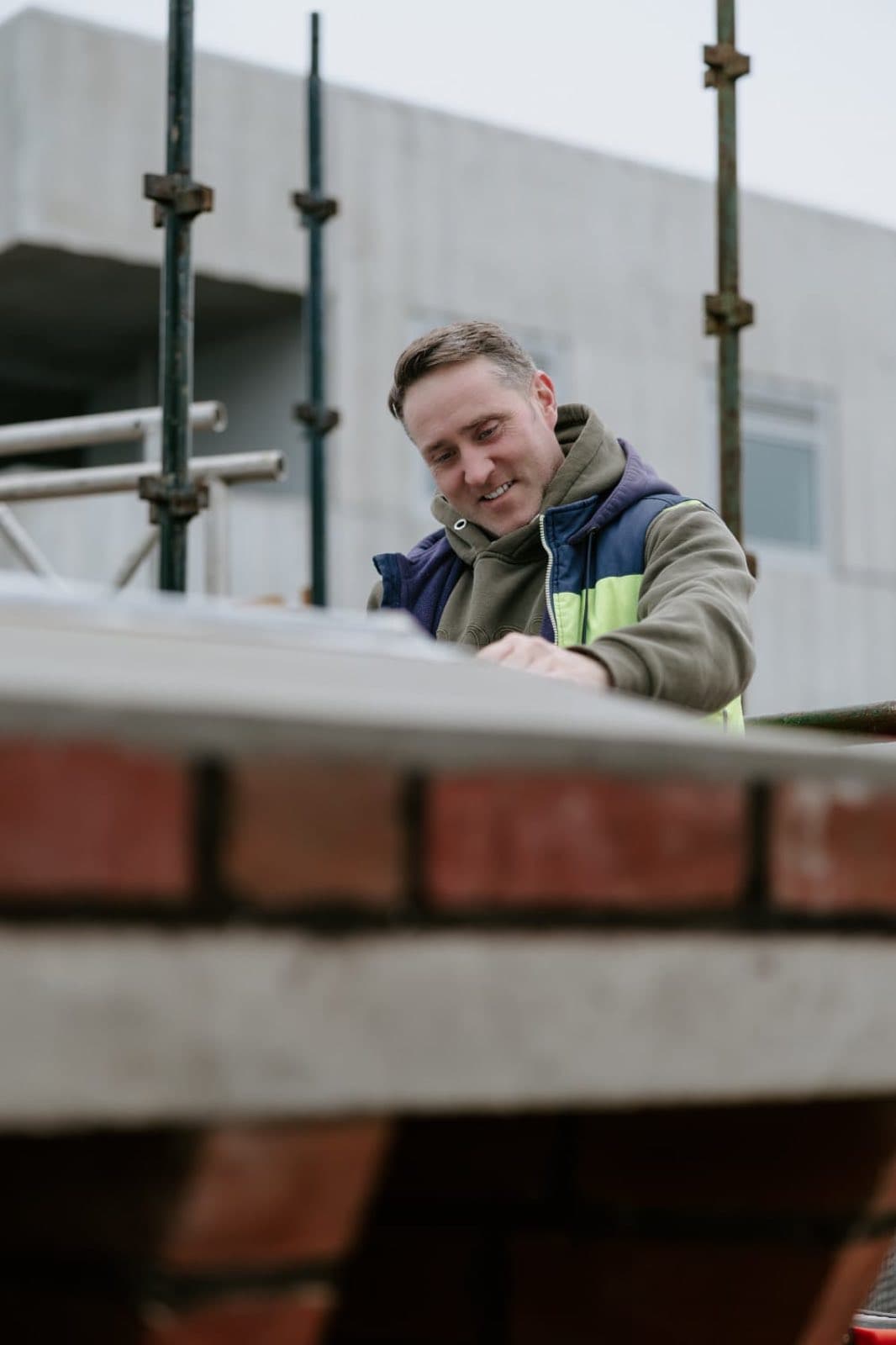 David Goodwin setting the capping on the Old Licorice Factory chimney crown in Brunswick