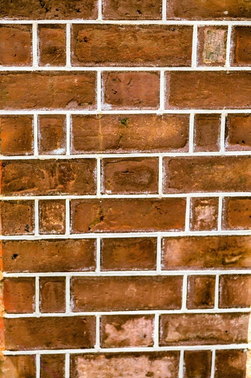 Close detail of traditional tuck pointing on heritage red brickwork by Goodwin Bricklaying