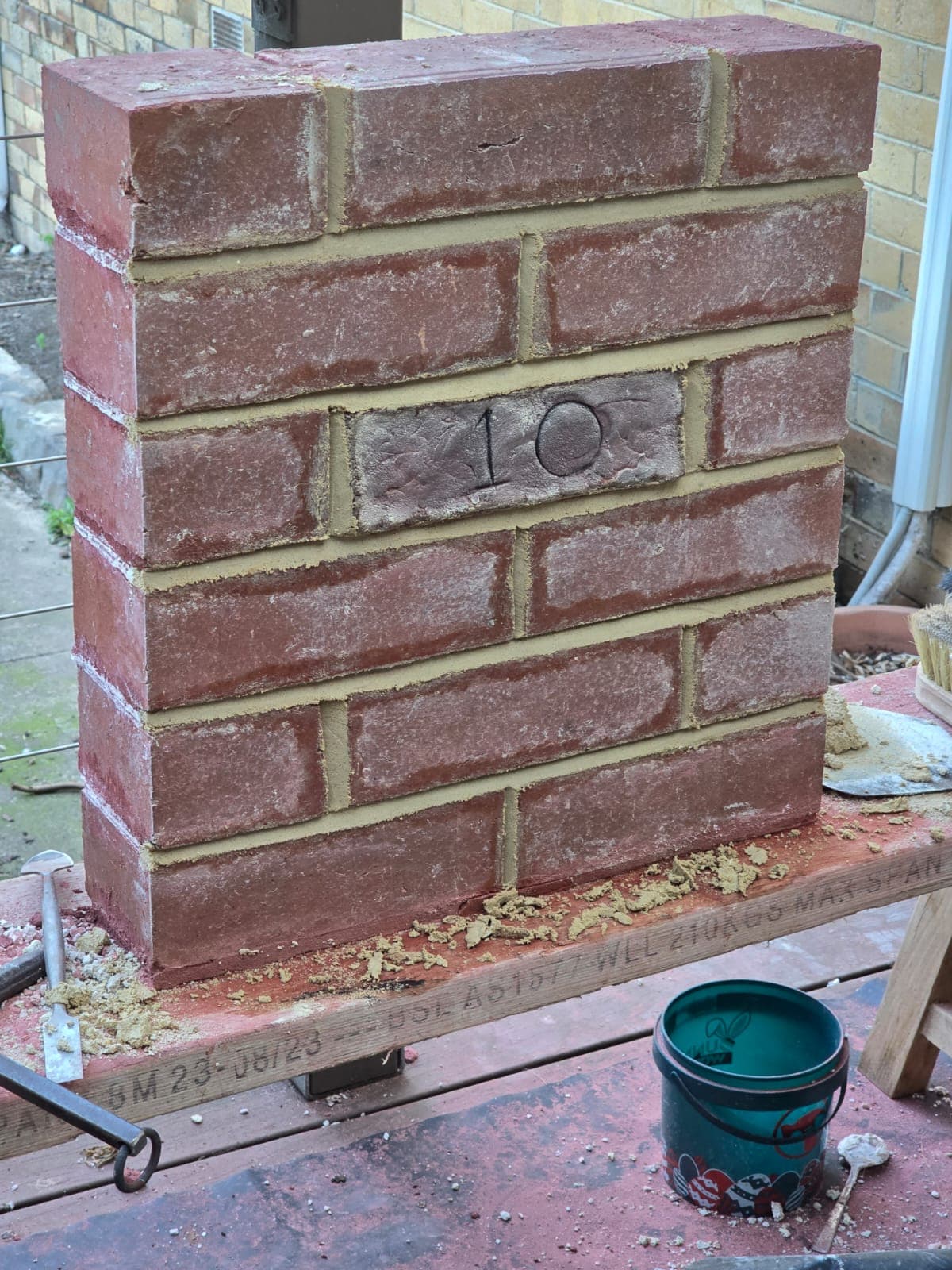 Fine tuck pointing detail with a contrasting mortar ribbon on heritage red brickwork by Goodwin Bricklaying